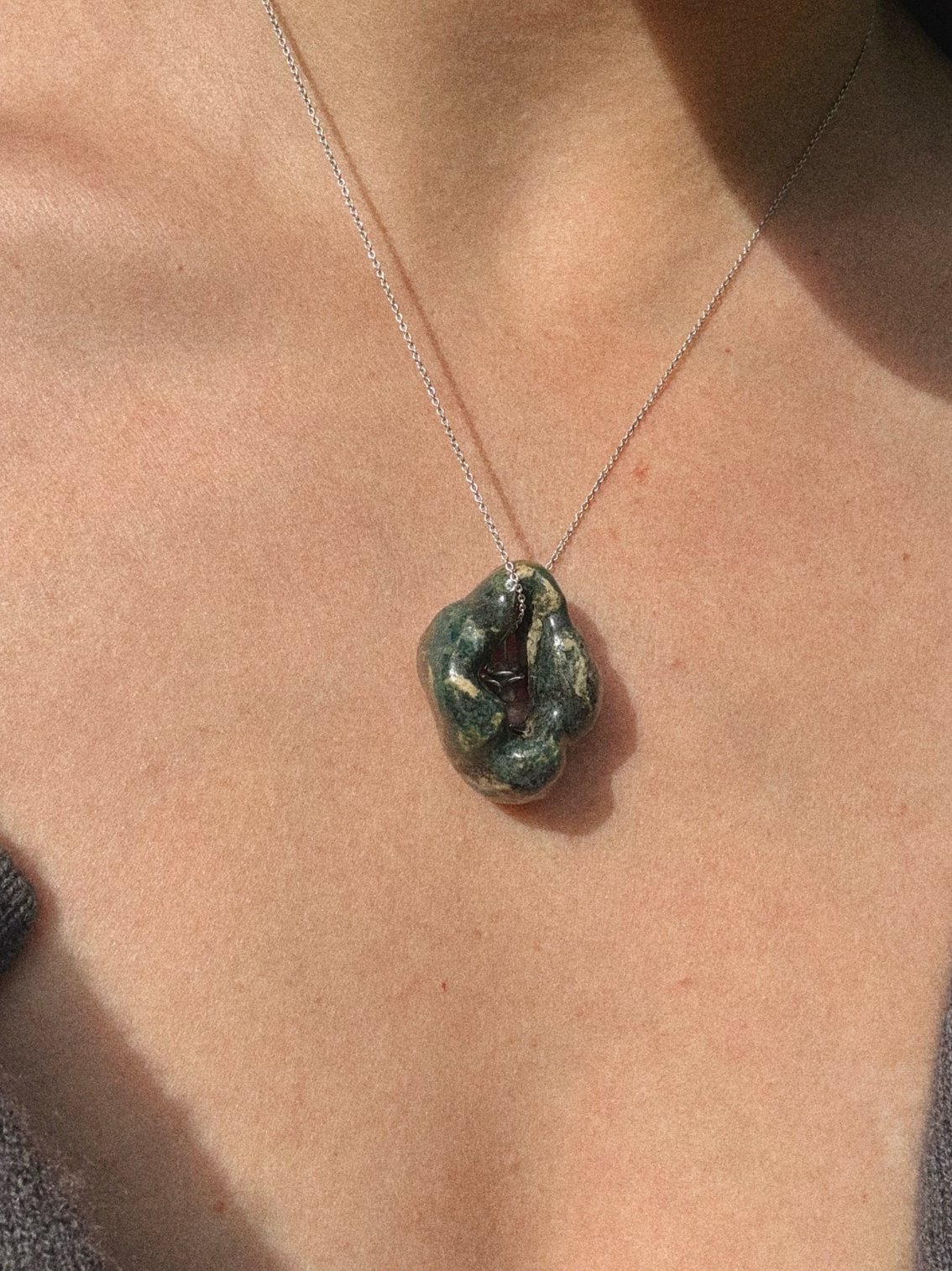 The Dinosaur Pendant