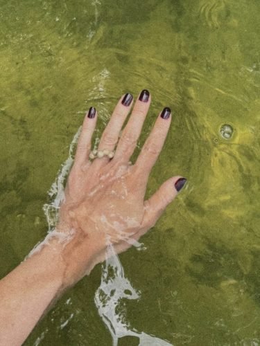 Hand built ceramic ring with bubbly details; white clay; beige-transparent glaze mix.